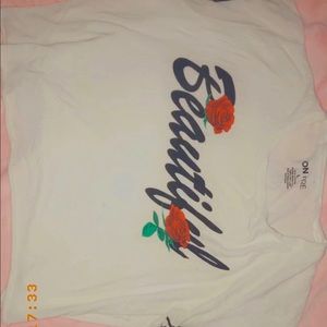 White crop top with the words beautiful.